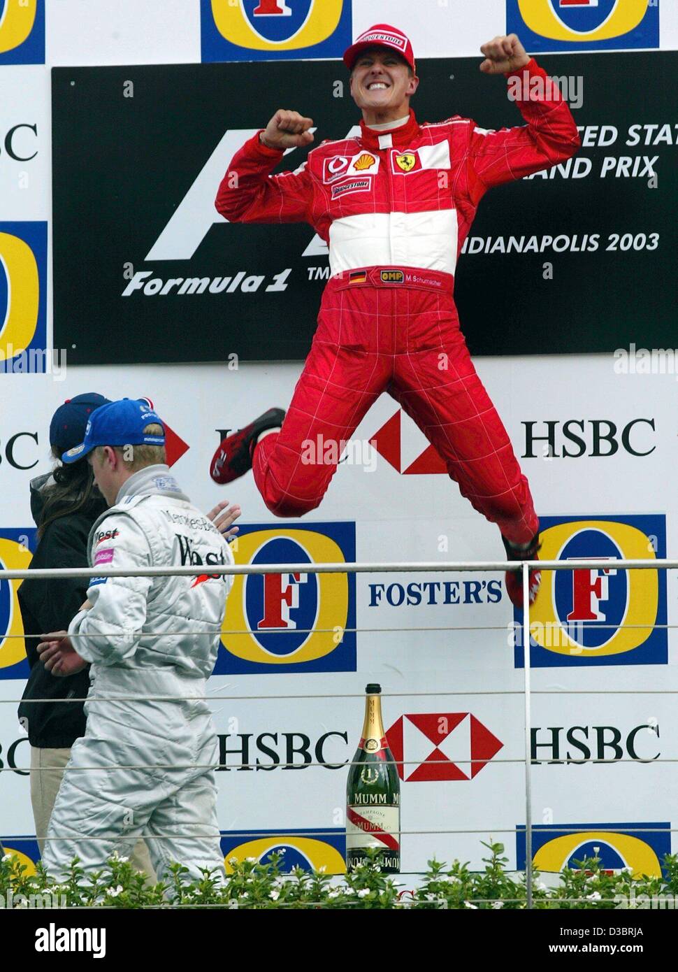 Formula 1 World Championship #F1 - Page 30 Dpa-german-formula-one-world-champion-michael-schumacher-jumps-into-D3BRJA