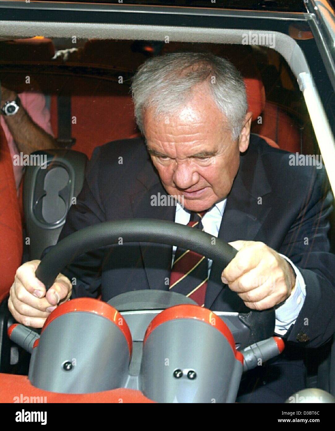 (dpa) - German Transport Minister Manfred Stolpe sits at the wheel of a Smart Forfour at the 60th international auto show IAA in Frankfurt, 19 September 2003. Stolpe is confident that the success of this year's IAA will have a positive effect on the sales of cars and on the German economy in general Stock Photo