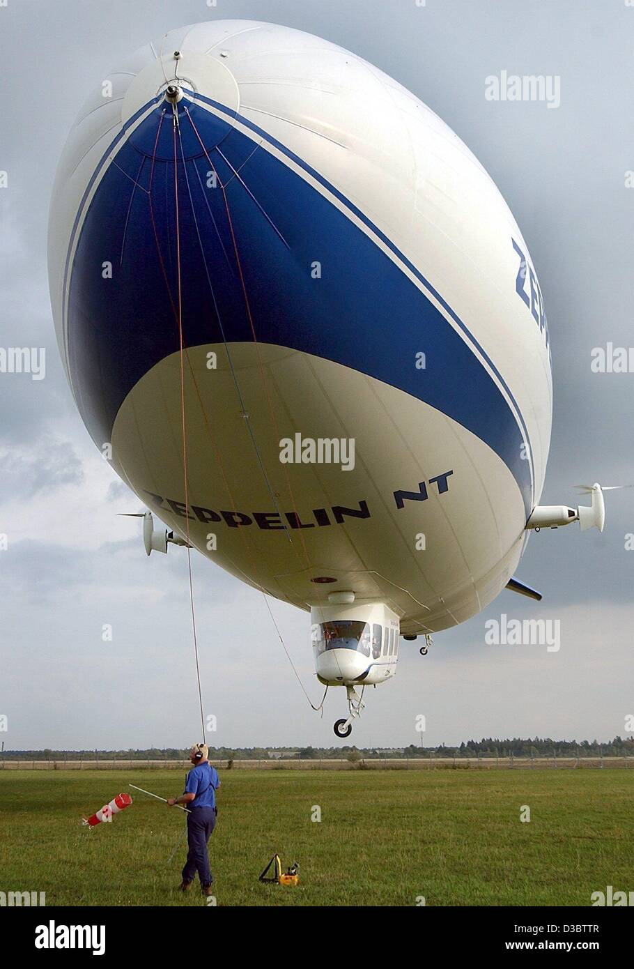 (dpa) - The Zeppelin NT lands in Oberschleissheim, Germany, 9 September 2003. It can carry up to 12 passengers at a maximum speed of 120 kmph. Stock Photo