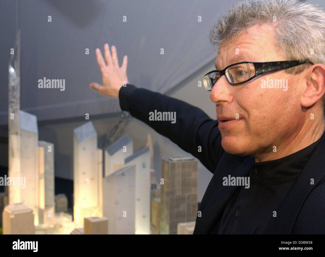 (dpa) - US architect Daniel Libeskind explains his model for a new design of Ground Zero, shown at the Jewish Museum in Berlin, 8 September 2003. Libeskind, whose design for the new centre won a competition earlier this year, said he didn't want to make substancial compromises on his original plans. Stock Photo
