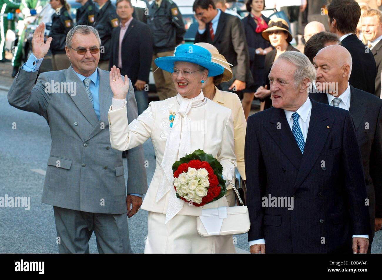 (dpa) Queen Margrethe II of Denmark and her husband Prince Henrik (L