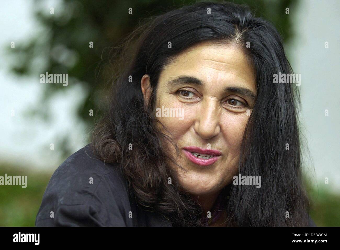 (dpa) - The Turkish authoress Emine Sevgi Oezdamar is the newly appointed city chronicler of Bergen-Enkheim in the north of Frankfurt, pictured in Frankfurt, 29 August 2003. The prize is endowed with 12,500 euros plus the rights to live free of charges in the traditional chronicler's residence, and  Stock Photo