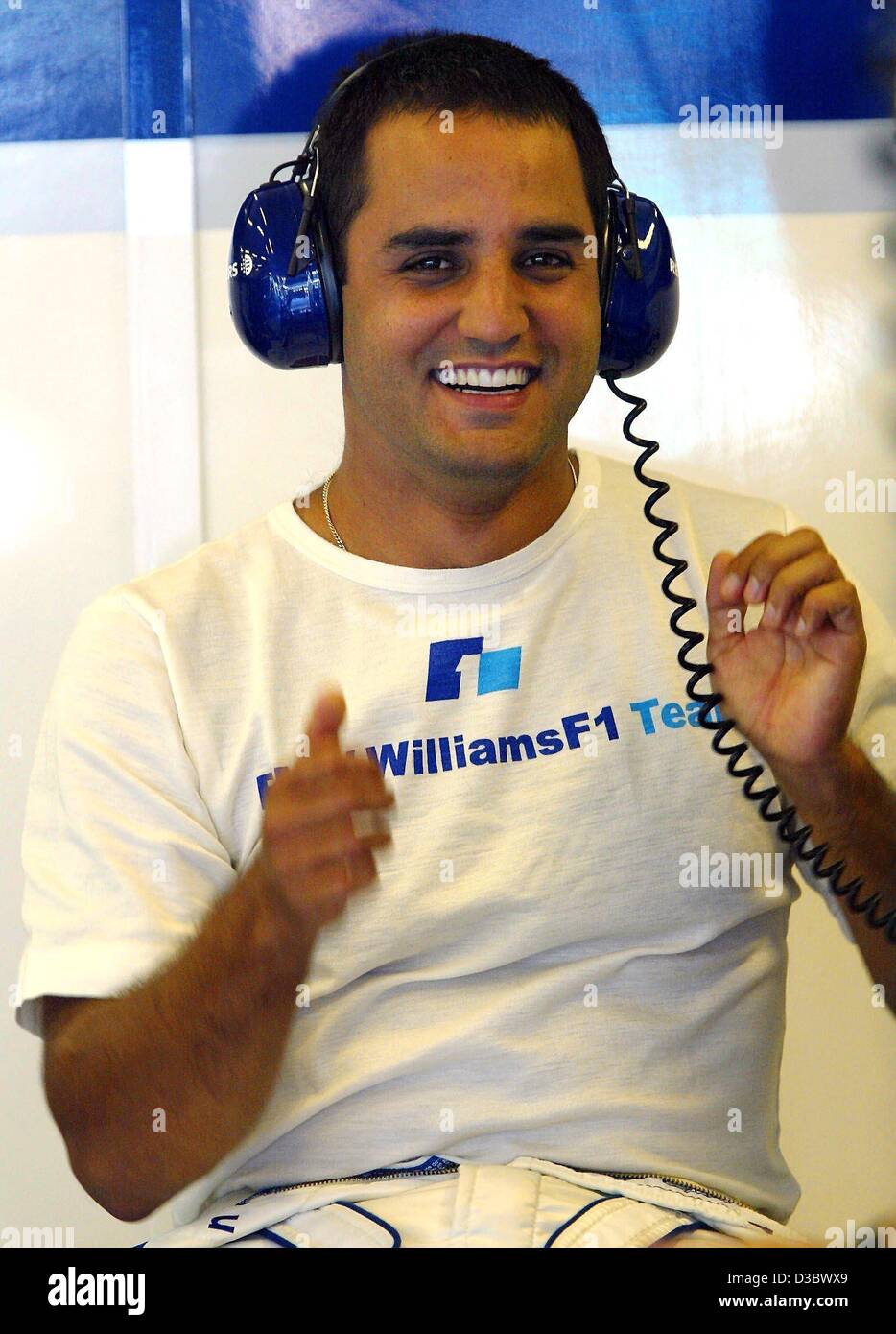 (dpa) - Colombian formula one pilot Juan Pablo Montoya (BMW-Williams) is in a good mood ahead of the free training on the Hungaroring near Budapest, 23 August 2003. He won second place in the Hungarian Grand Prix on 24 August. Stock Photo
