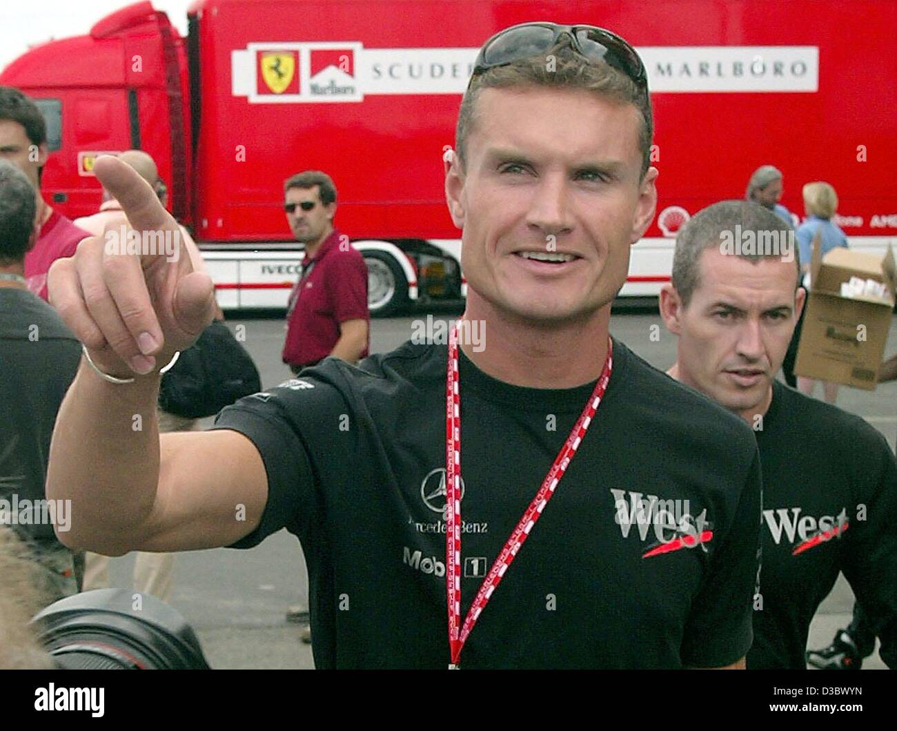 (dpa) - Scottish formula one pilot David Coulthard of McLaren-Mercedes gestures at the Hungaroring race track in Budapest, Hungary, 21 August 2003. The 13th run of the world championships, the Grand Prix of Hungary, will take place on 24 August. Stock Photo