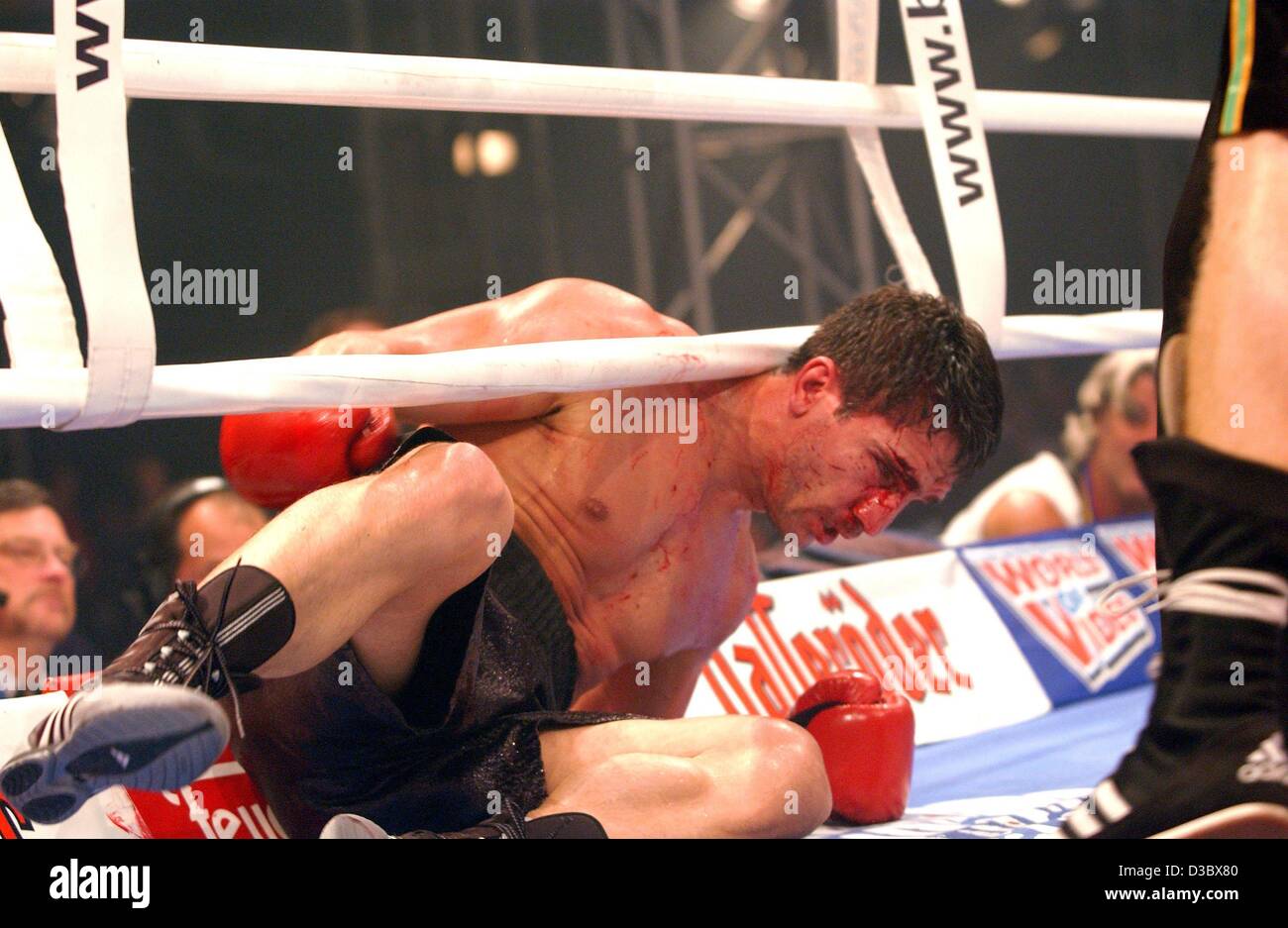 Sports spo boxing fight lying injured bleeding germany hires stock