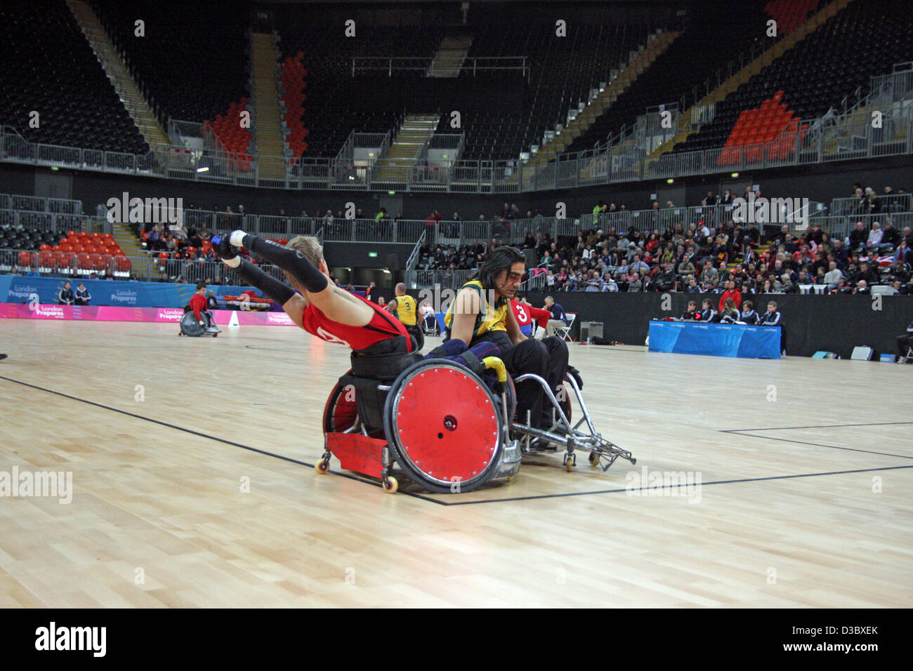 Steve Brown of GB v Naz Erdem of Australia in the wheelchair rugby at the basketball arena in the Olympic park Stratford. Stock Photo