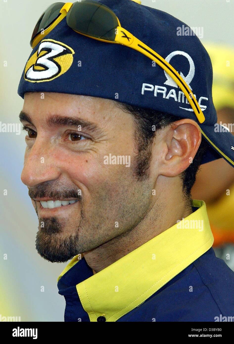 (dpa) - Italian motorcycling race driver Max Biaggi, pictured during the motorcycling Grand Prix on the Sachsenring near Hohenstein-Ernstthal, Germany, 27 July 2003. Biaggi drives in the MotoGP class. Stock Photo