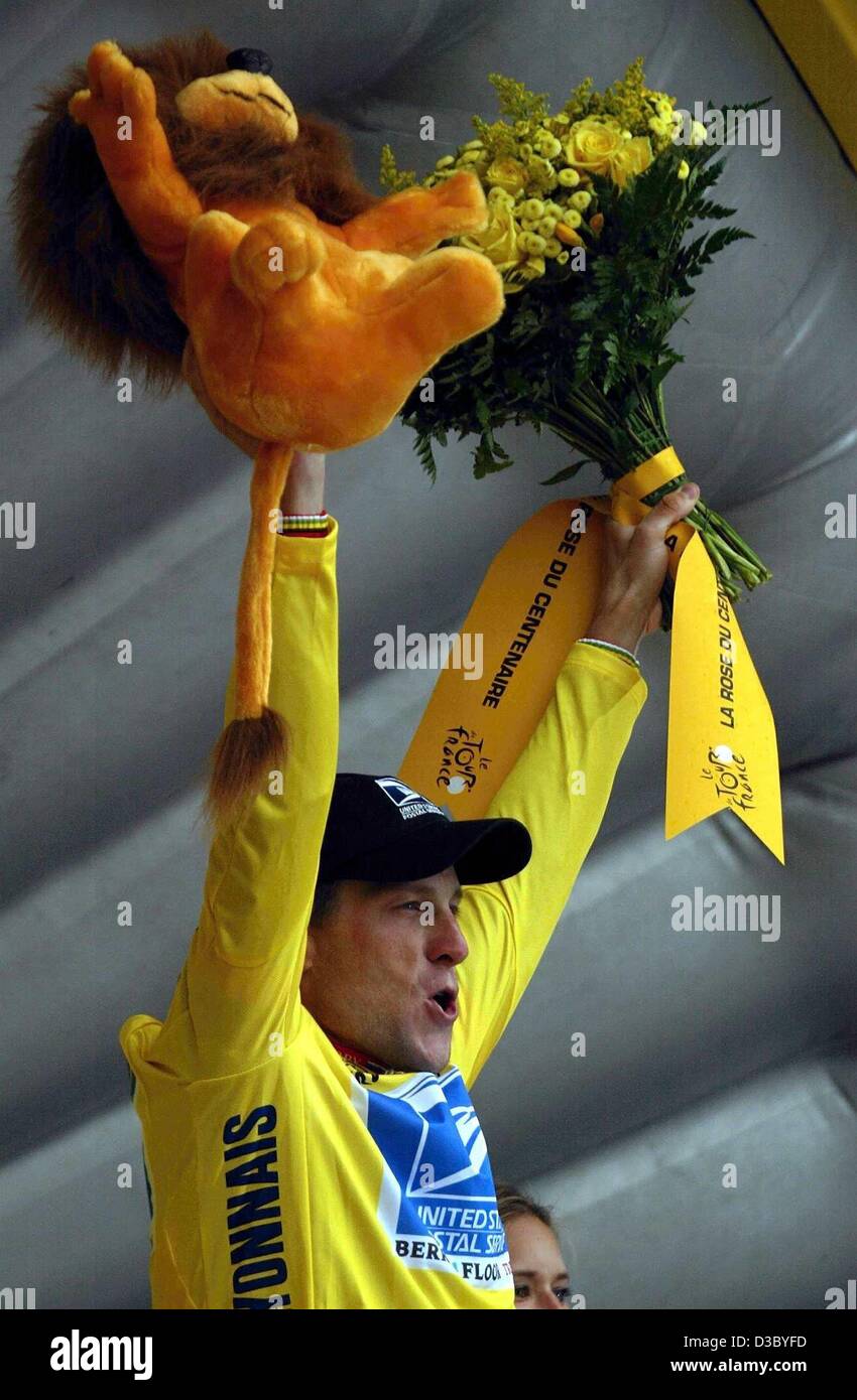 (dpa) - US Postal-Berry Floor's US Lance Armstrong celebrates his overall leader's yellow jersey on the podium following the individual time trial of the 19th stage of the 2003 Tour de France cycling race in Nantes, France, 26 July 2003. Armstrong clocked the third fastest time. The 19th stage led 4 Stock Photo