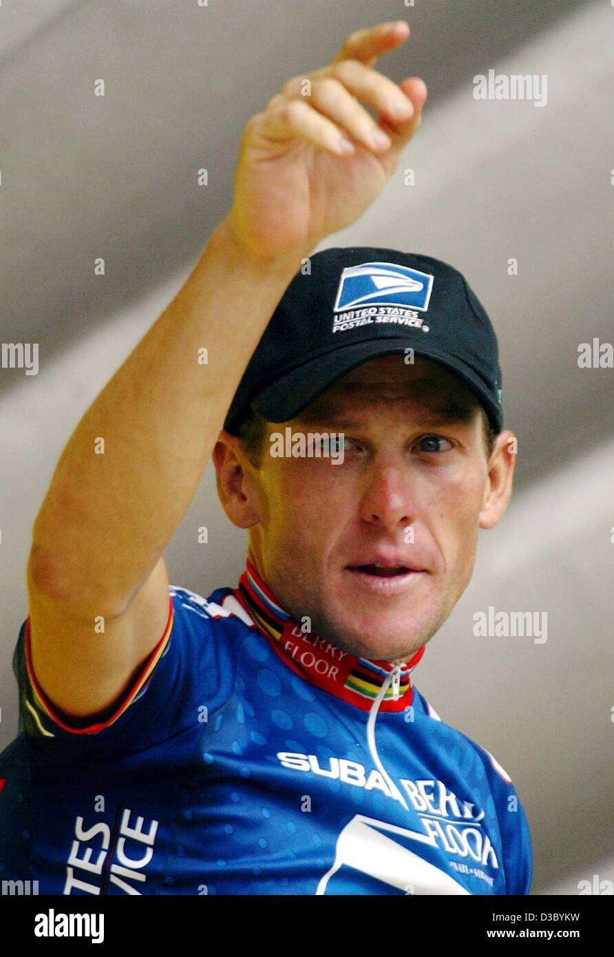 (dpa) - US Postal-Berry Floor's Lance Armstrong from the US gestures on the podium before putting on the overall leader's yellow jersey after the 16th stage of the 2003 Tour de France cycling race in Bayonne, France, 23 July 2003. The 197.5km long 16th stage of the world's biggest cycling race led t Stock Photo