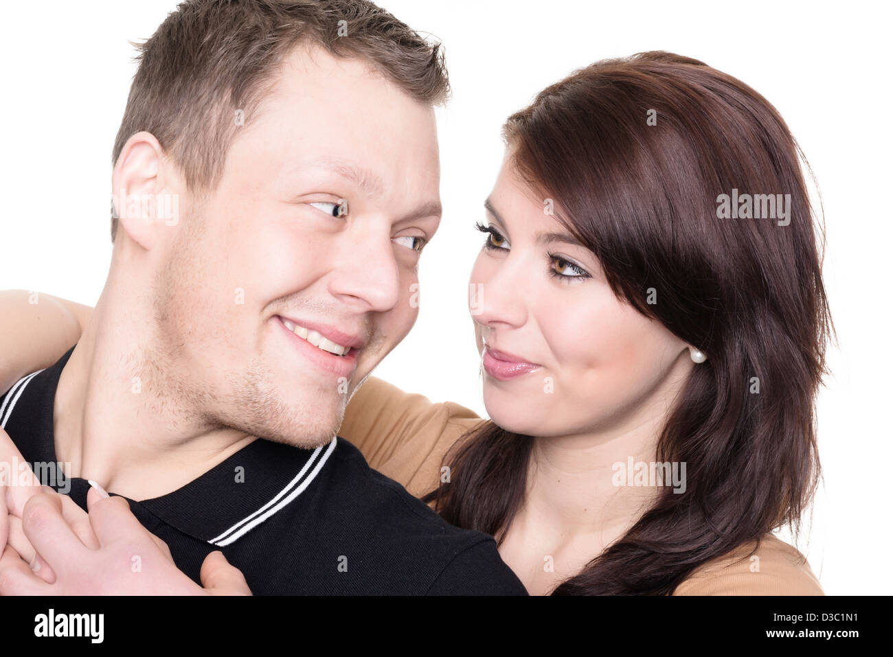 Young and happy couple in front of white background Stock Photo - Alamy