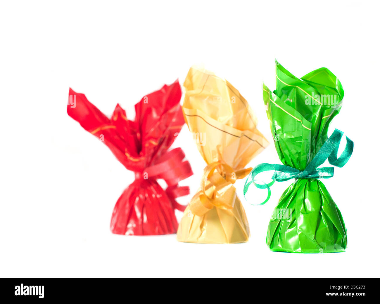 three objects, yellow, green, red, diet, sweet wrapper, hard candy, packaging, multi colored, color image, isolate Stock Photo