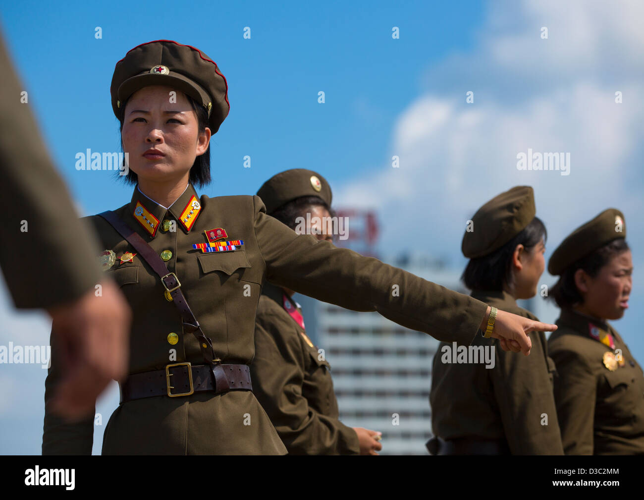North Korean Female Soldiers In Tower Of The Juche Idea, Pyongyang, North Korea Stock Photo