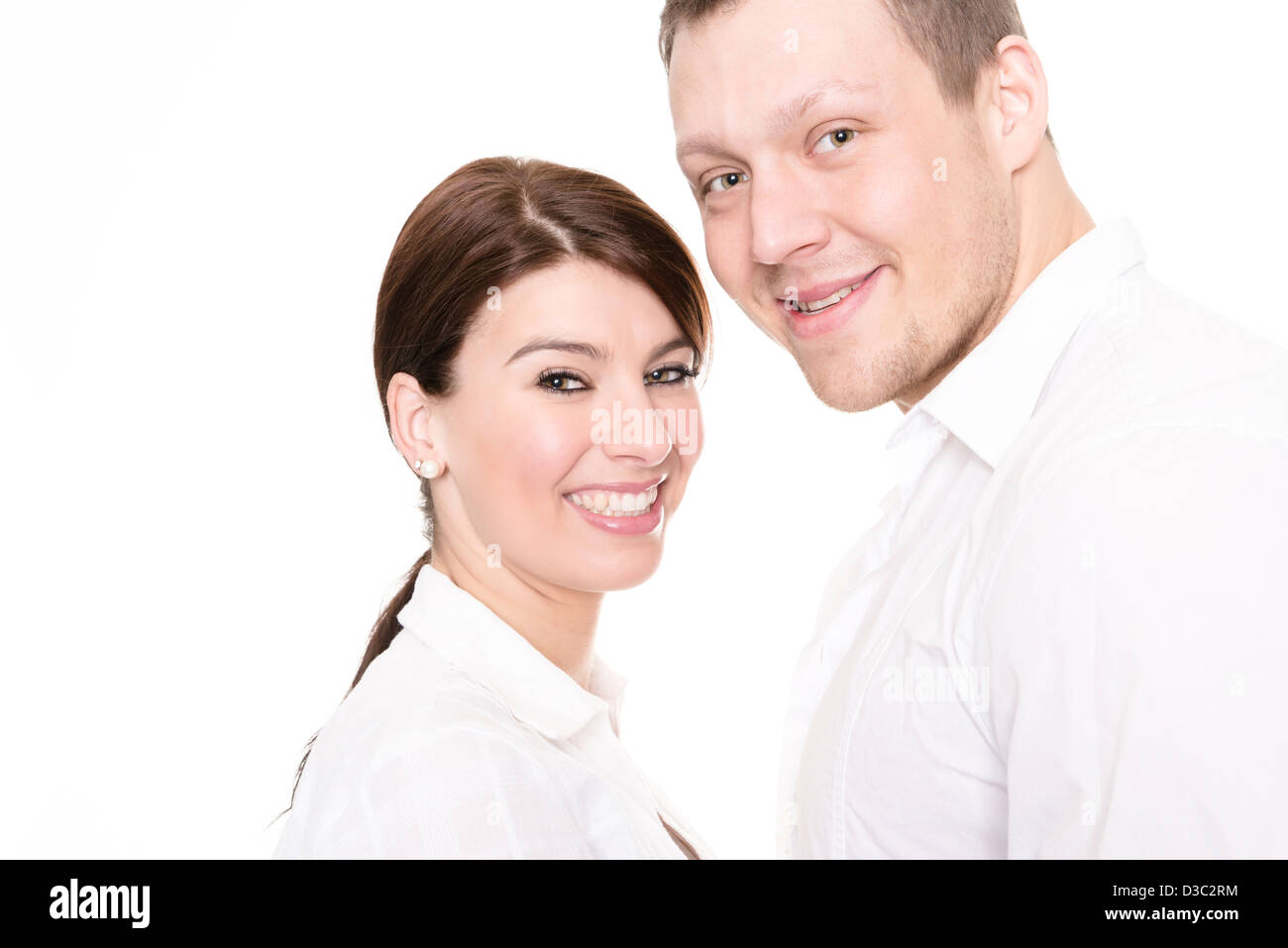 Young and happy couple in front of white background Stock Photo - Alamy