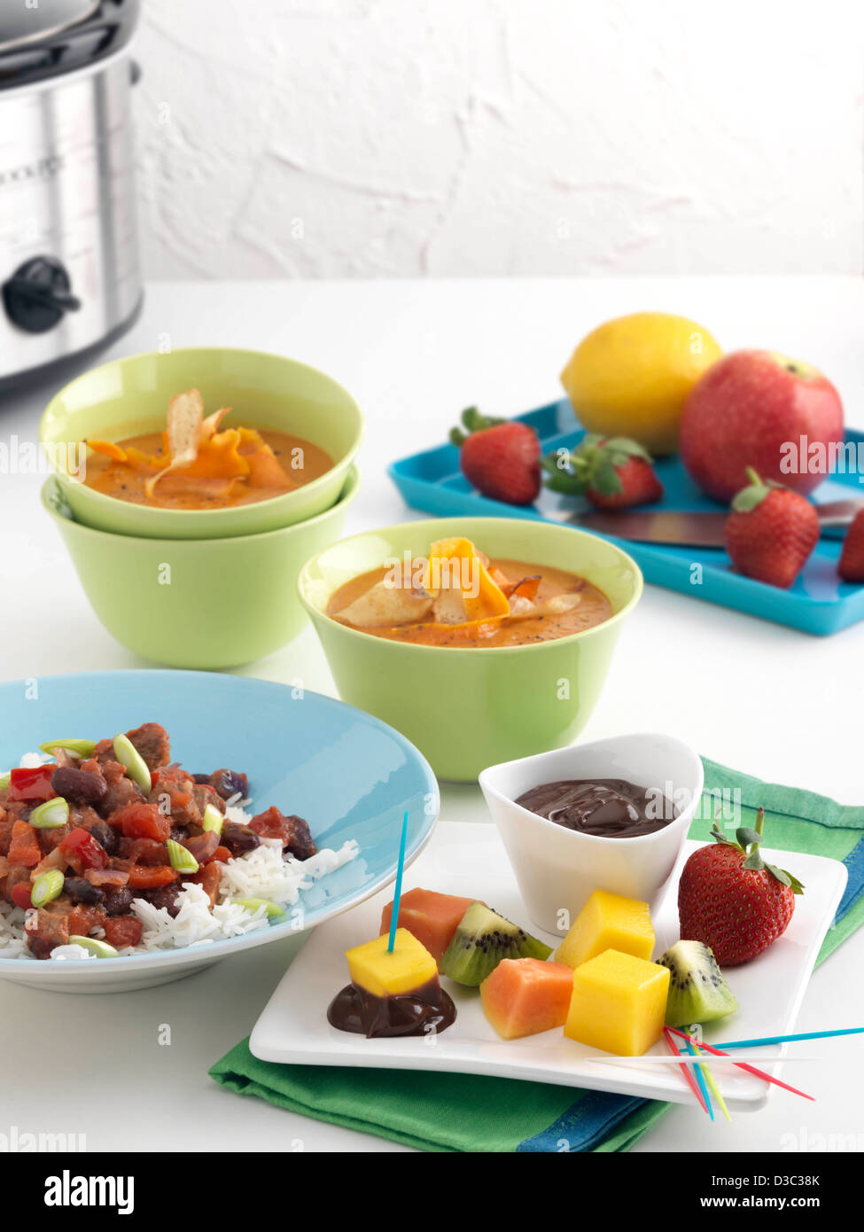Slow cooker with slow cooked recipes food dishes Stock Photo