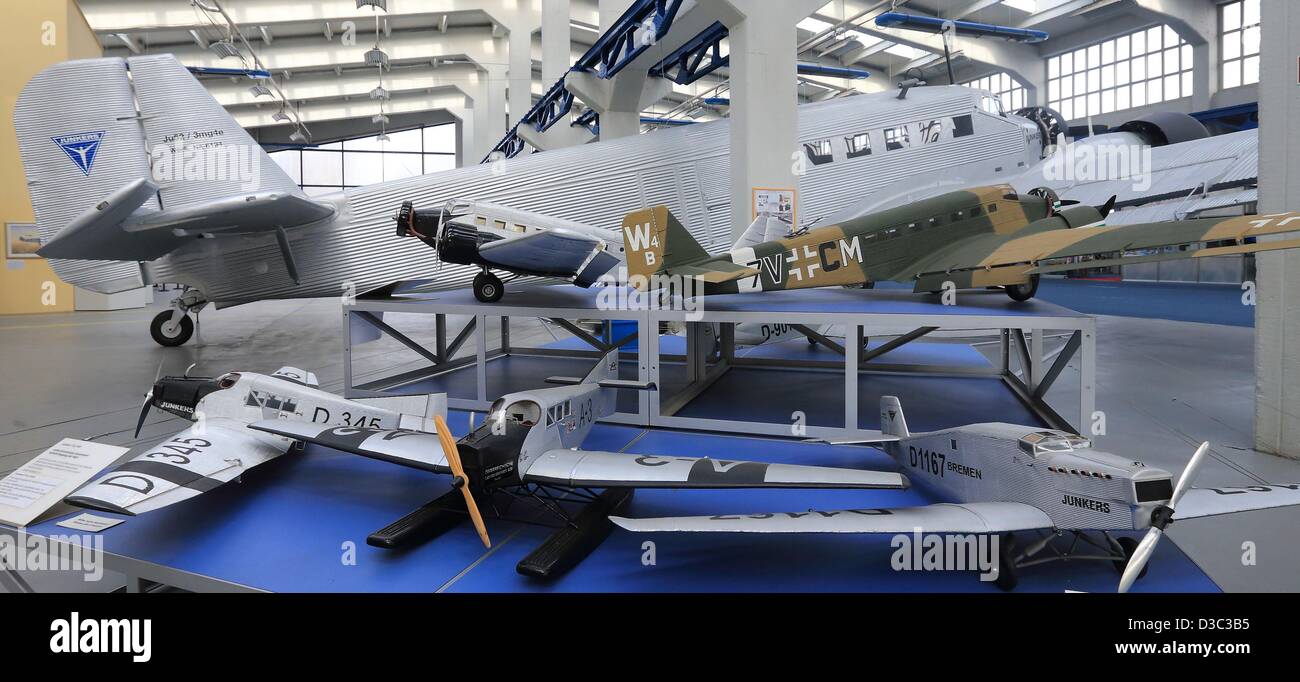 Model airplanes stand in front of a Junkers JU 52 aircraft at the technical musuem Hugo Junkers in Dessau/Rosslau, germany, 14 february 2013. The museum focuses on life and work of the German engineer Hugo Junkers (1859-1935). The piece 'Der fliegende Mensch - eine Junkers-Saga' ('The flying man - A Junkers Saga) will be will premiere in Dessau on 23 February 2013. Photo: Jens Wolf Stock Photo