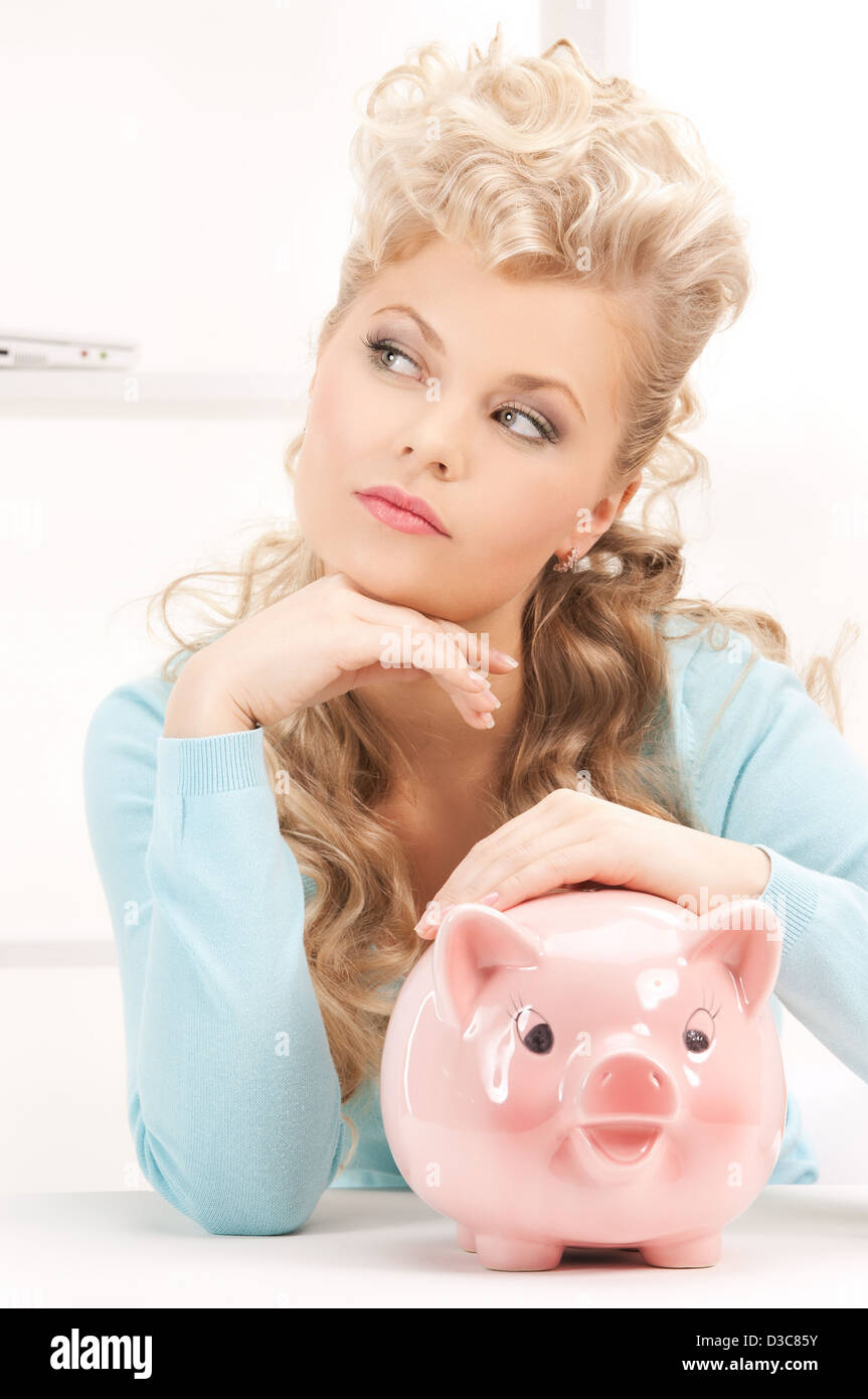 lovely woman with piggy bank Stock Photo - Alamy