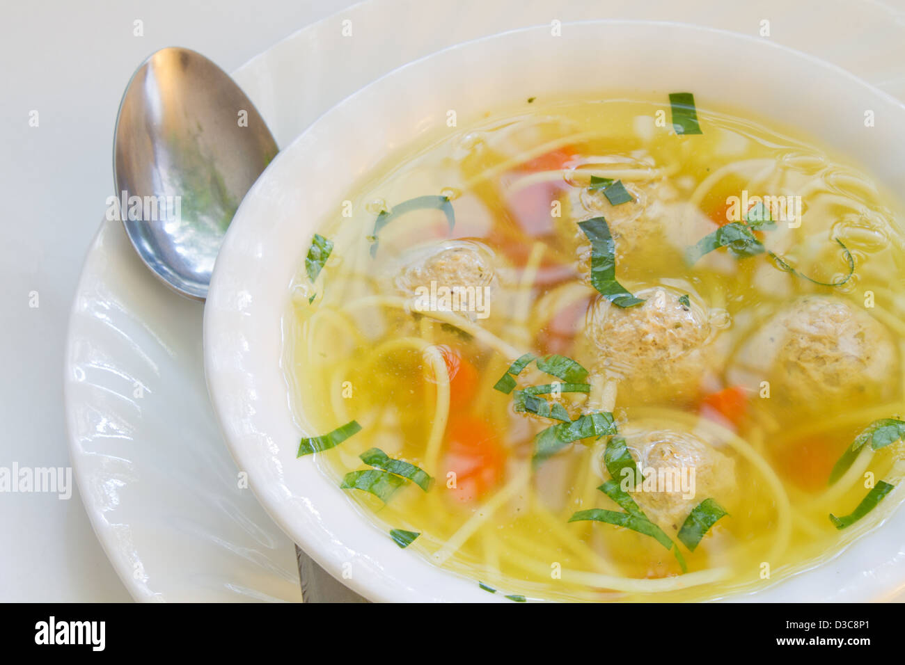 Chicken soup with meat balls and noodles. Stock Photo