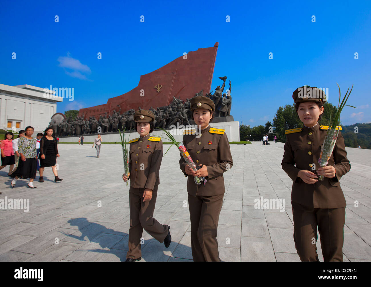 Soldier Girls Paying Respect To The Two Statues Of The Dear Leaders In Grand Monument Of Mansu Hill, Pyongyang, North Korea Stock Photo