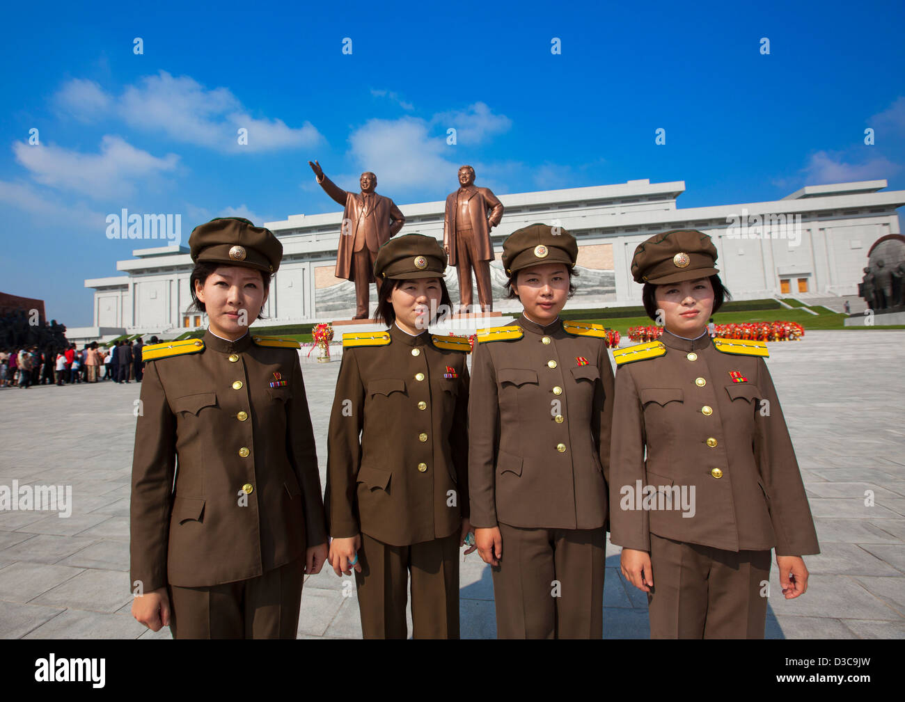 Soldier Girls Paying Respect To The Two Statues Of The Dear Leaders In Grand Monument Of Mansu Hill, Pyongyang, North Korea Stock Photo