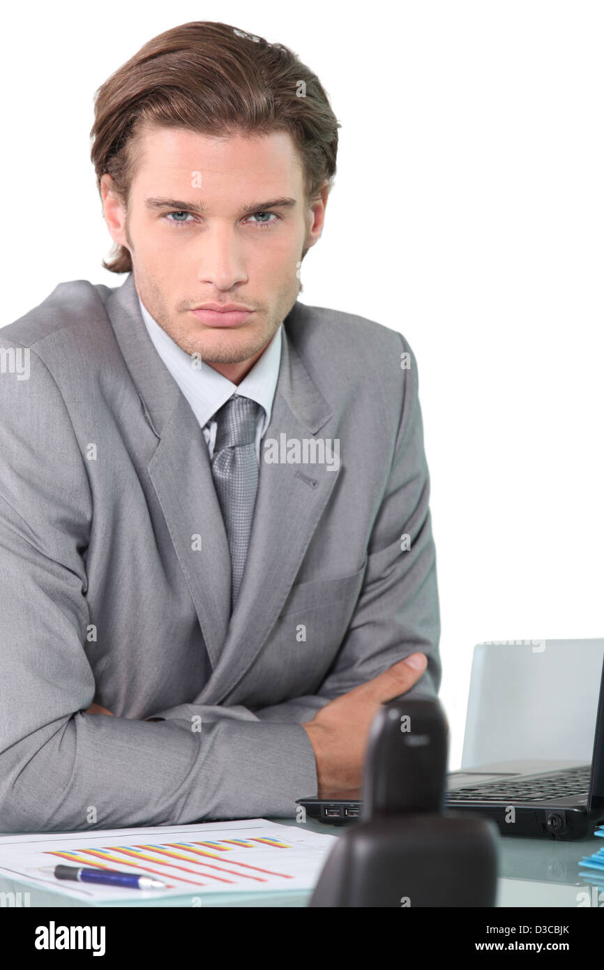 Young businessman at his desk Stock Photo Alamy