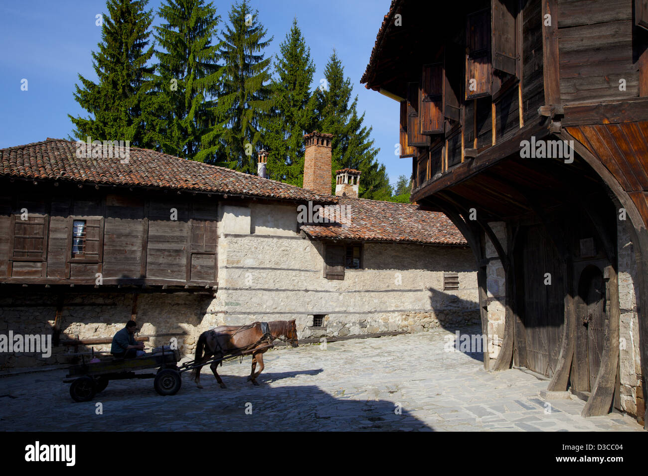 Bulgaria, Europe, Koprivshtitsa, Old Town, Local Man Riding Horse Drawn Cart. Stock Photo