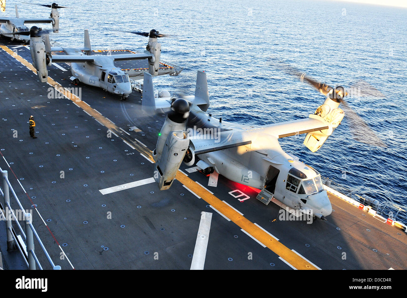 US Navy MV-22 Osprey aircraft line up to take off from the multipurpose amphibious assault ship USS Boxer February 13, 2013 underway off the coast of California. Stock Photo