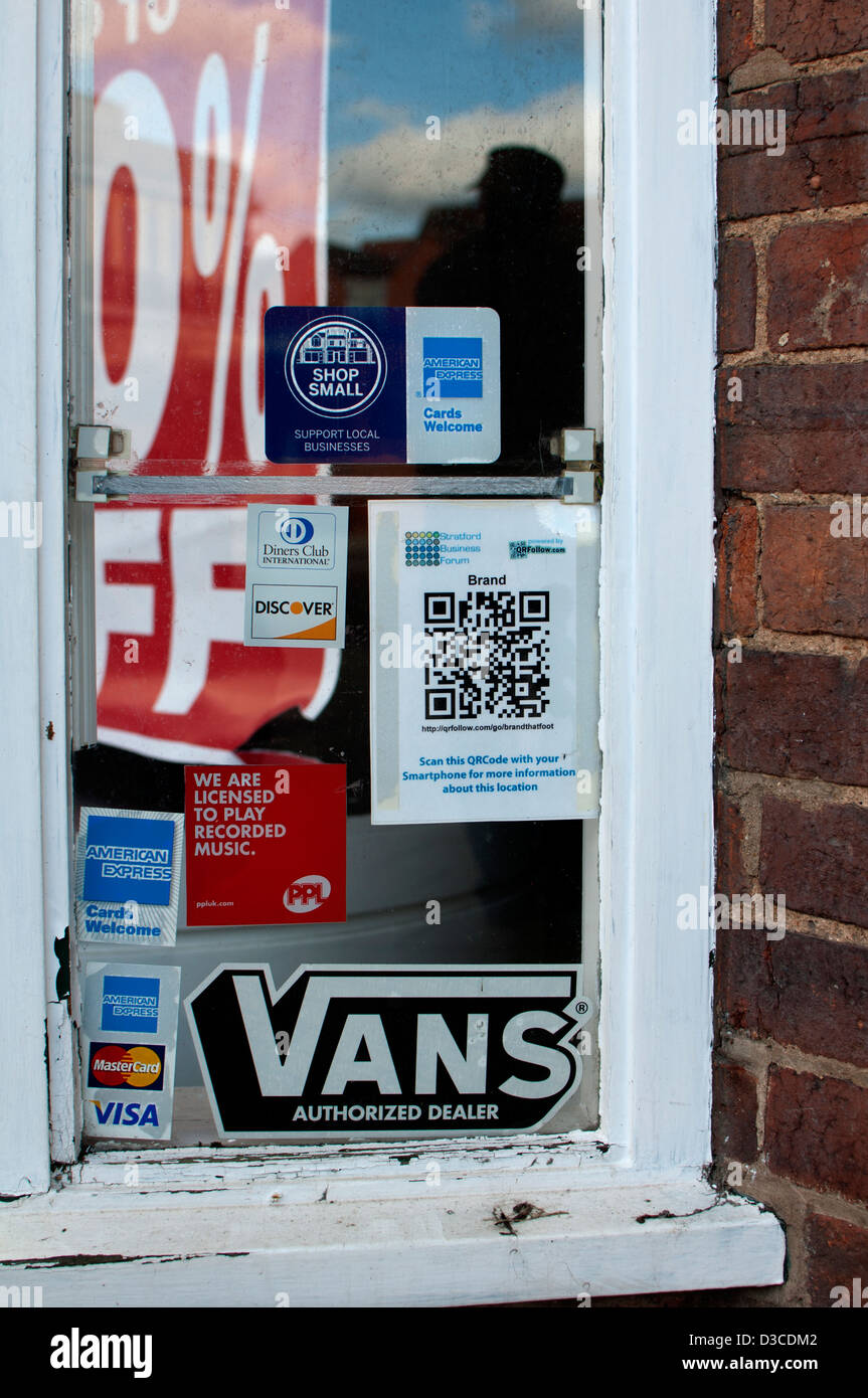 QR code in shop window, UK Stock Photo