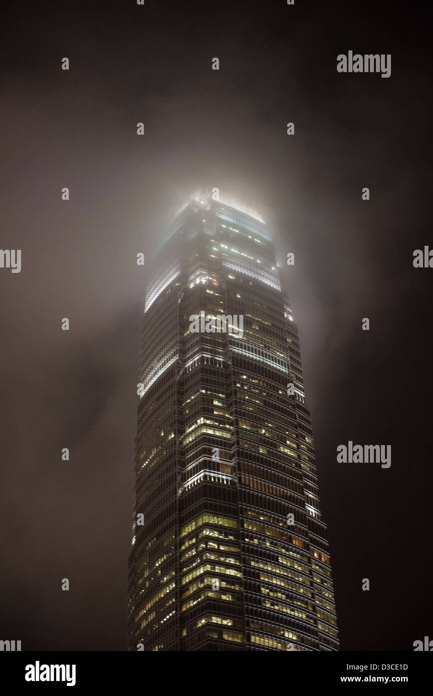 Hong Kong, March 2012 International finance Centre in Central fading in a foggy night. Photo Kees Metselaar Stock Photo