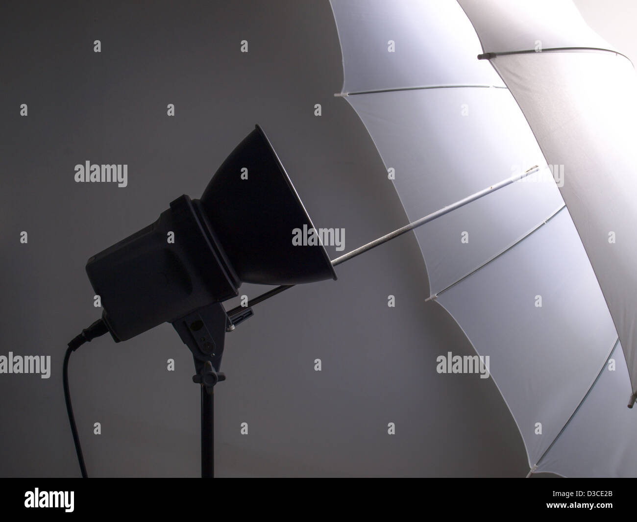 A light reflector umbrella used in photo studio Stock Photo Alamy