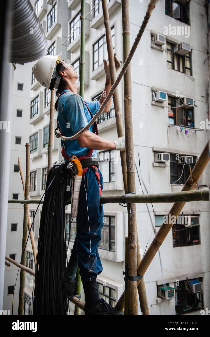 Bamboo scaffolding built up around the Kiu Fat Building ,still being used for its durability, lightness and flexibility. Stock Photo