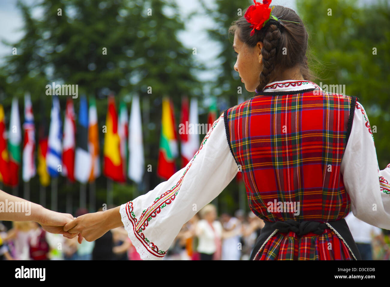 Bulgaria, Europe, Kazanlak, Flower Festival Parade, Girl Dancing In Her Traditional Costume. Stock Photo