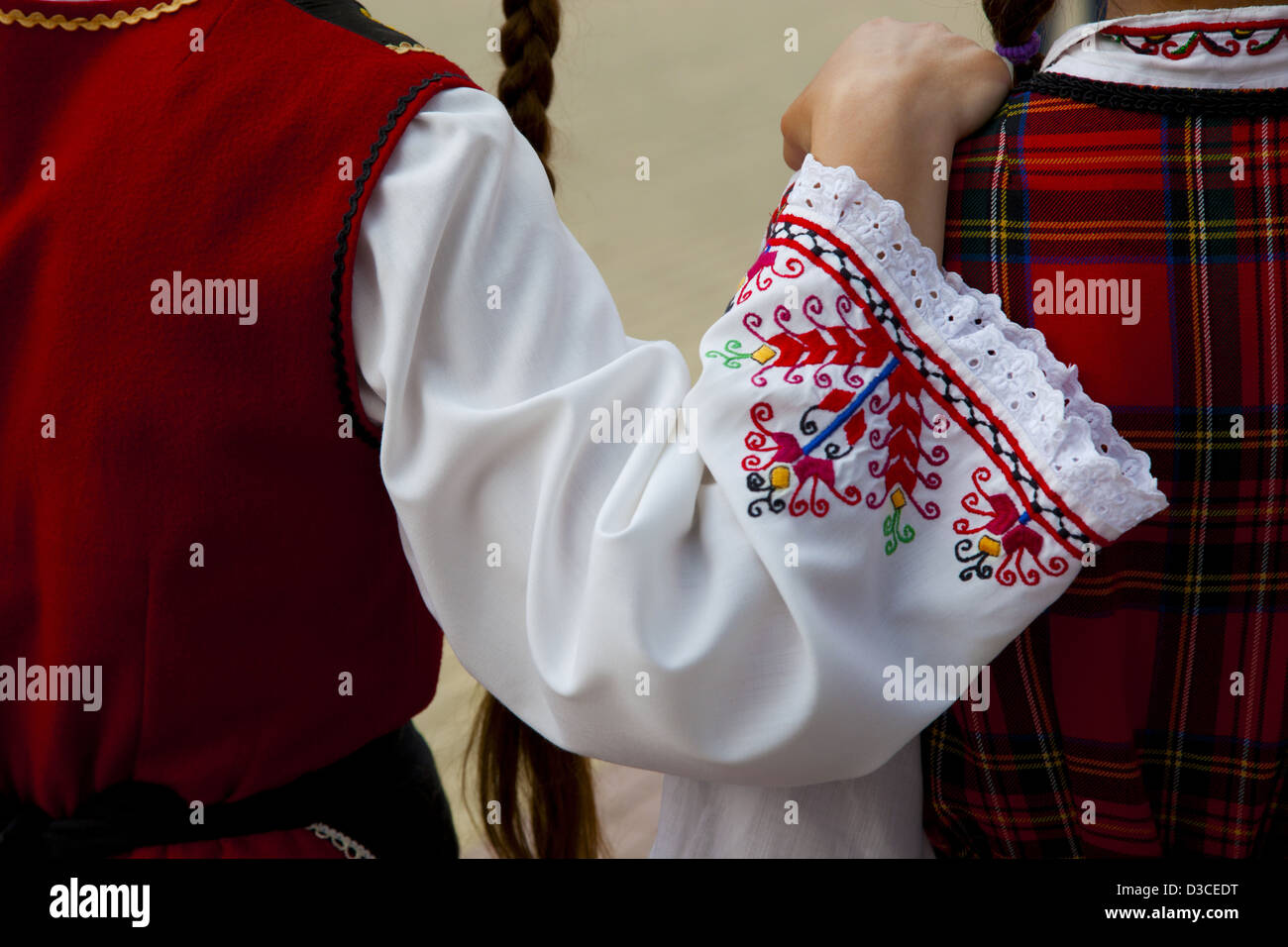Bulgaria, Europe, Kazanlak, Valley Of The Roses, Flower Festival Parade, Two Local Girls Wearing Traditional Costumes. Stock Photo
