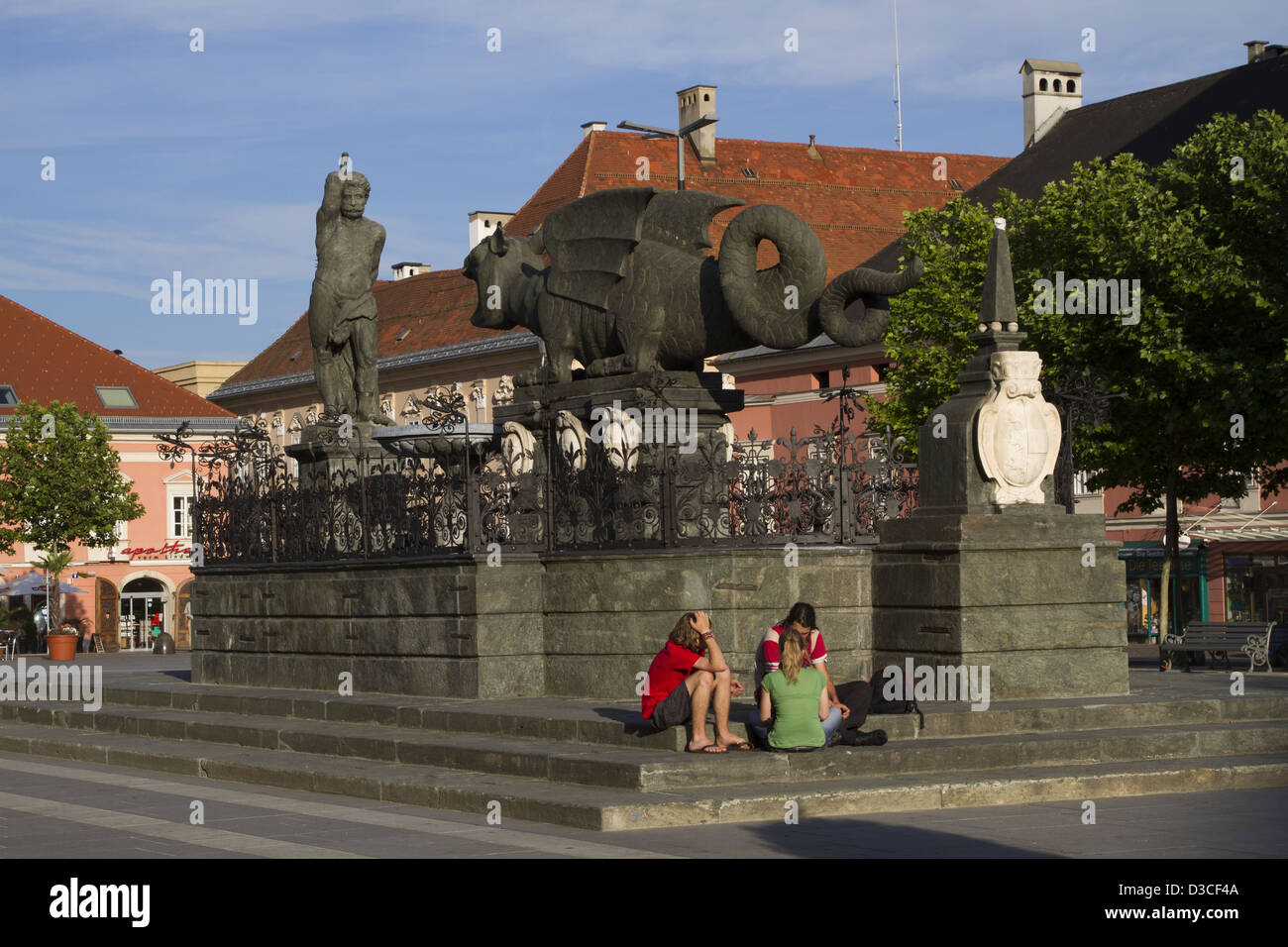 Austria, Carinthia, Klagenfurt Am Worthersee, Neuer Platz, Lindwurm Fountain Stock Photo
