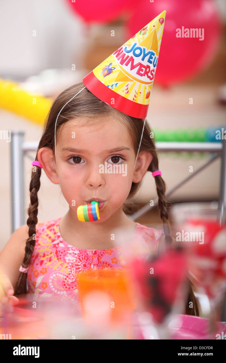Children birthday party blowing noise hires stock photography and