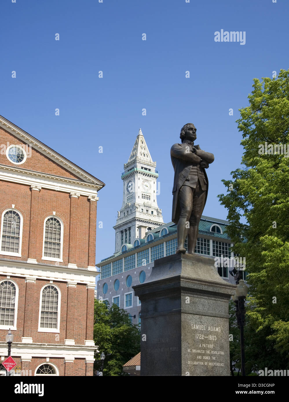 Statue Of Samuel Adams In Front Of Faneuil Hall With The Custom House