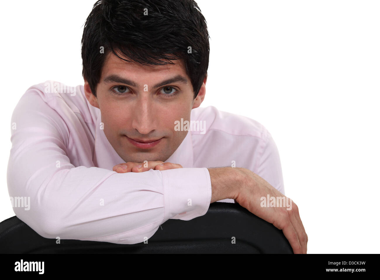 Man sitting backwards chair hires stock photography and images Alamy
