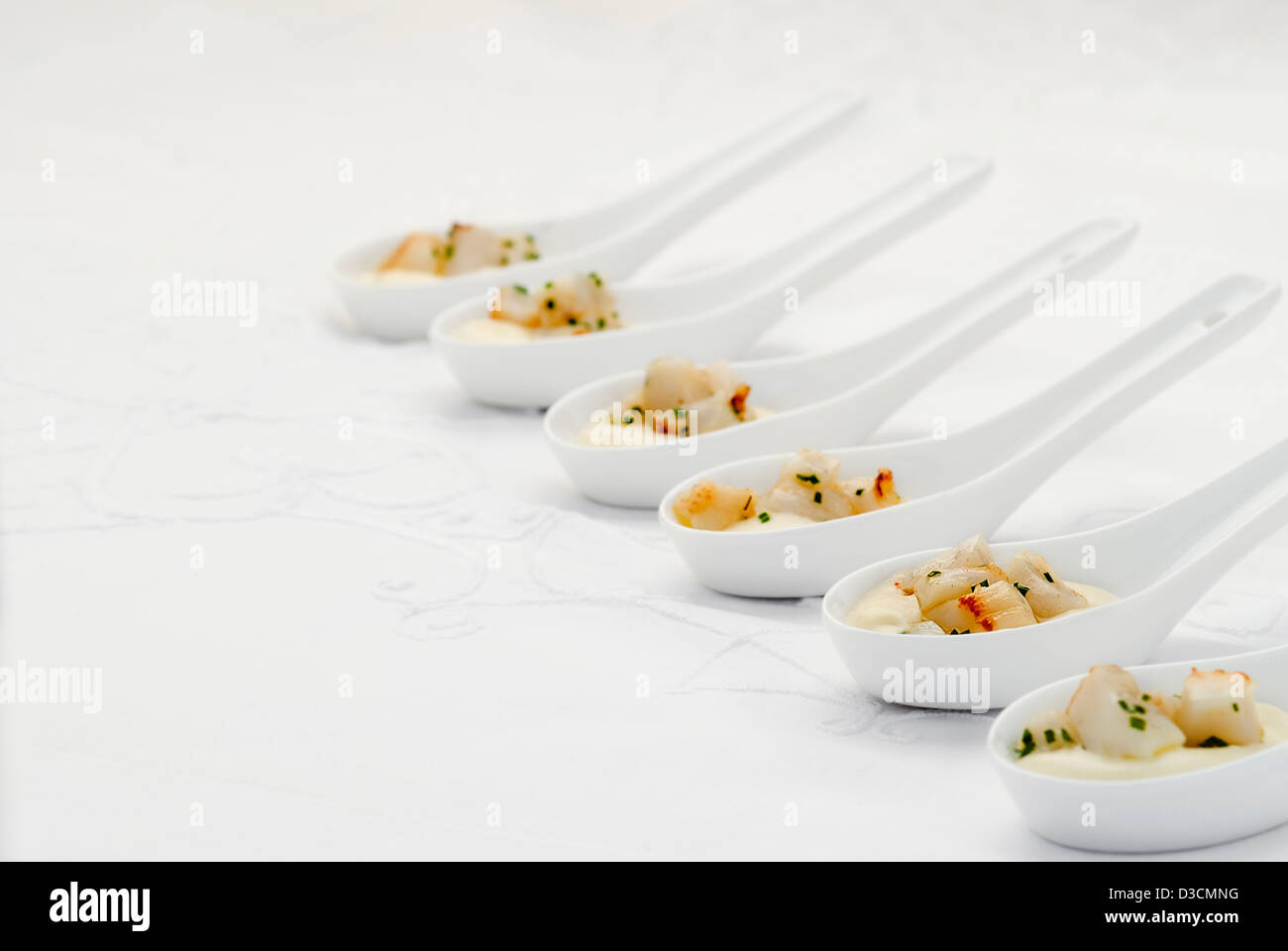 Seared scallops with cauliflower puree Stock Photo