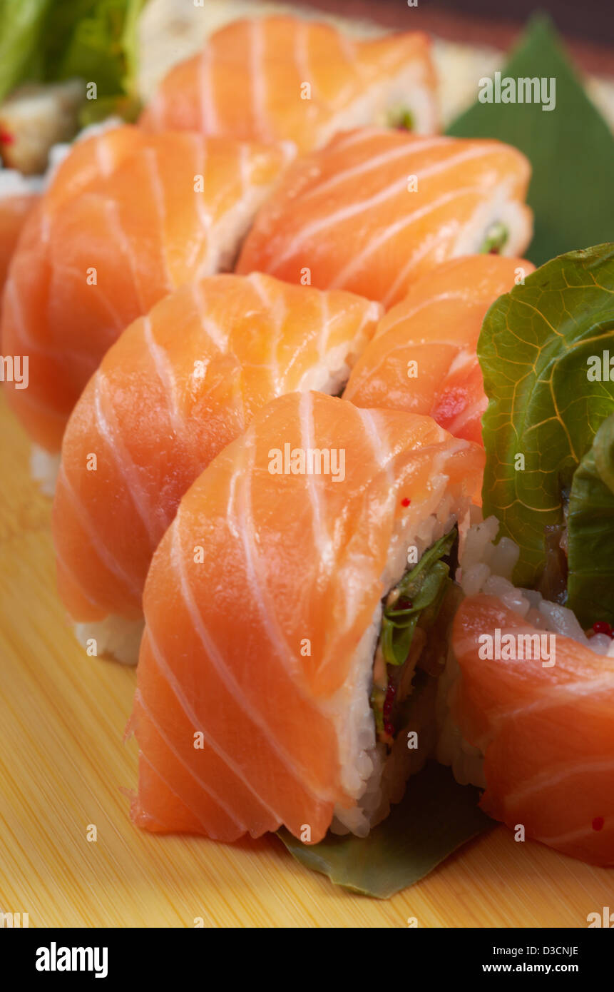 Uramaki. Philadelphia classic. Salmon, Philadelphia cheese, cucumber, avocado, tobiko. Japanese sushi Stock Photo