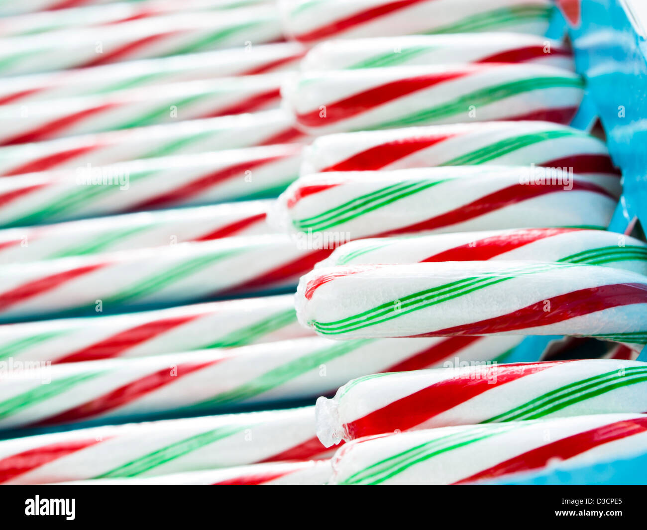 White, red and green peppermint candy canes in a box Stock Photo Alamy