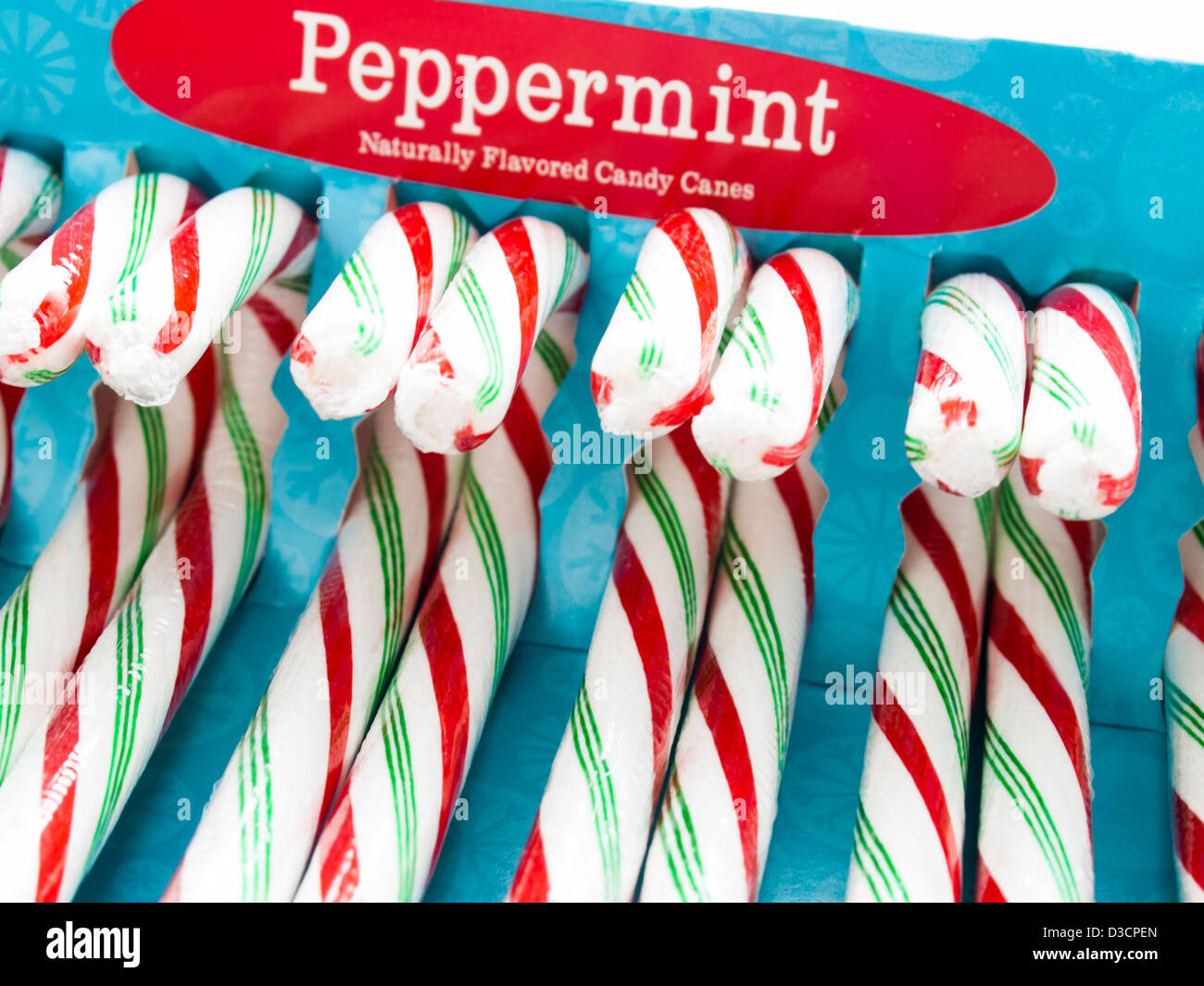 White, red and green peppermint candy canes in a box Stock Photo Alamy