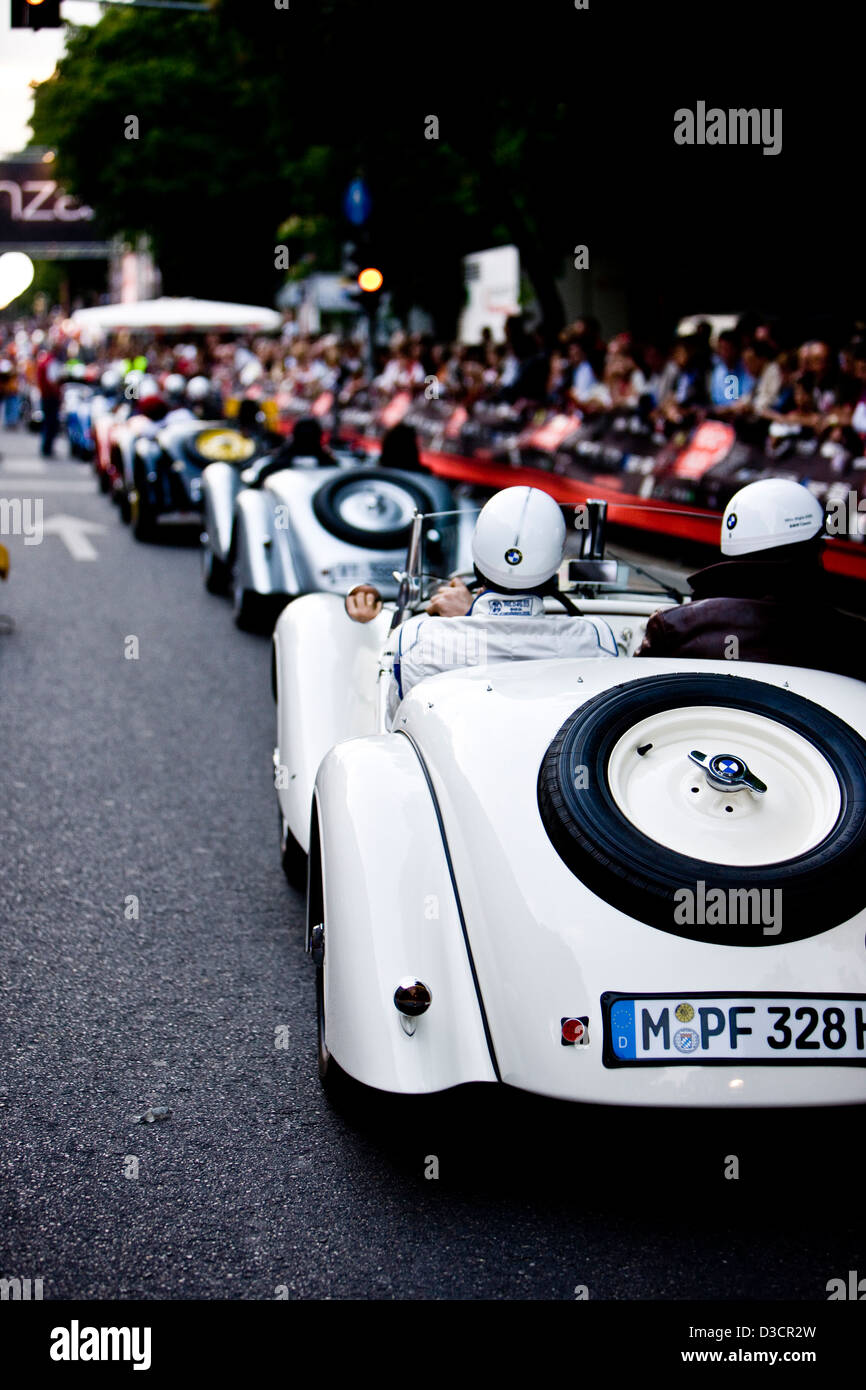 Racing cars on road, Mille Miglia car race, Italy, 2008 Stock Photo
