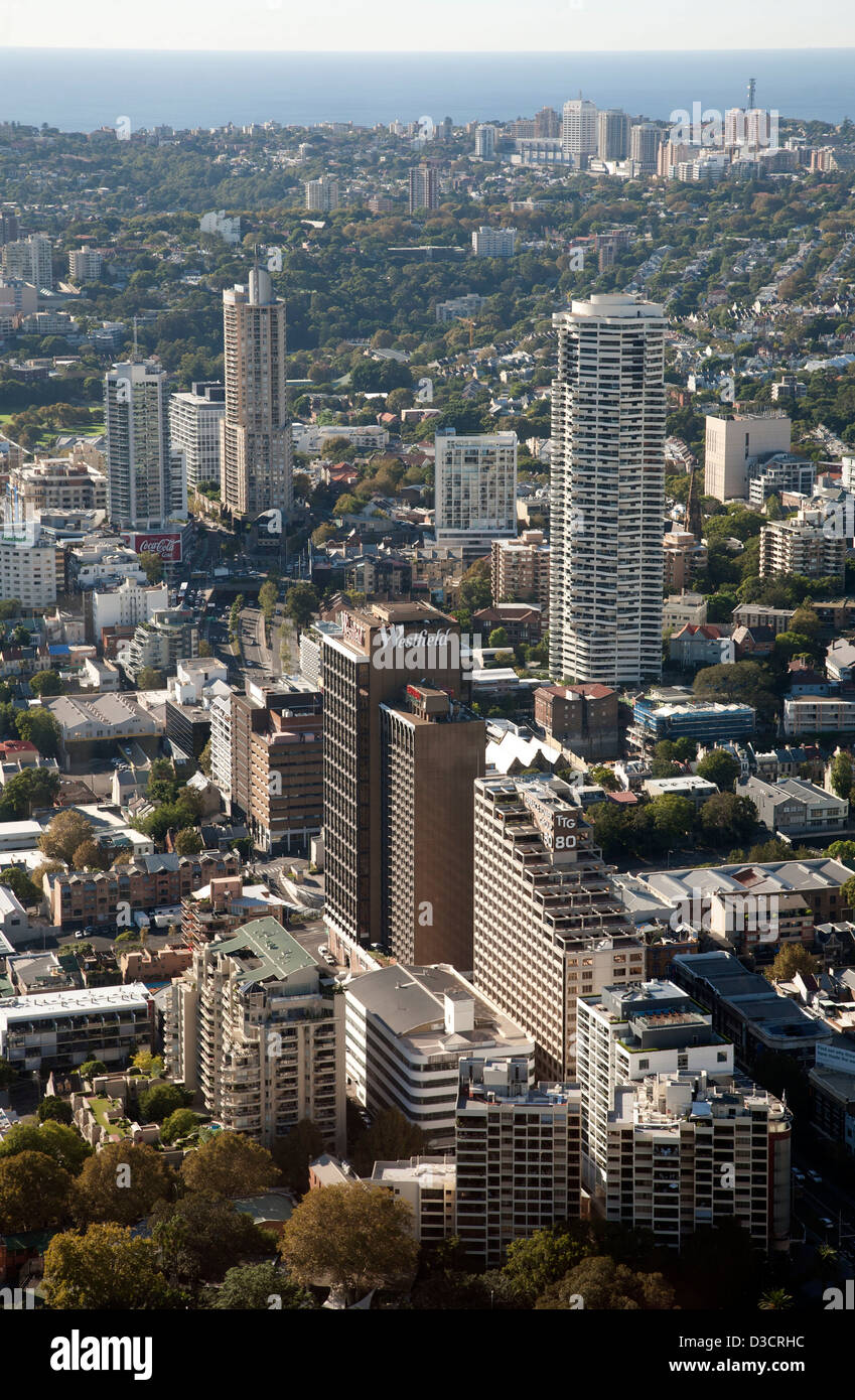 Surrounded by high-rise office buildings William Street Darlinghurst leads through to King's Cross Sydney Australia Stock Photo