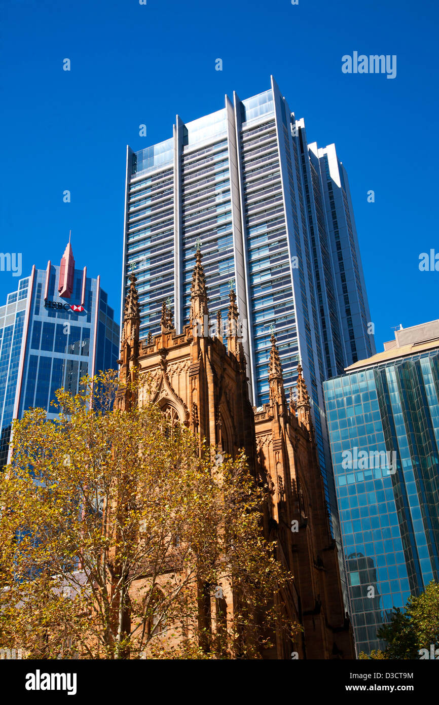 St. Andrew's Anglican Cathedral with modern office building in background Town Hall Square Sydney Australia Stock Photo