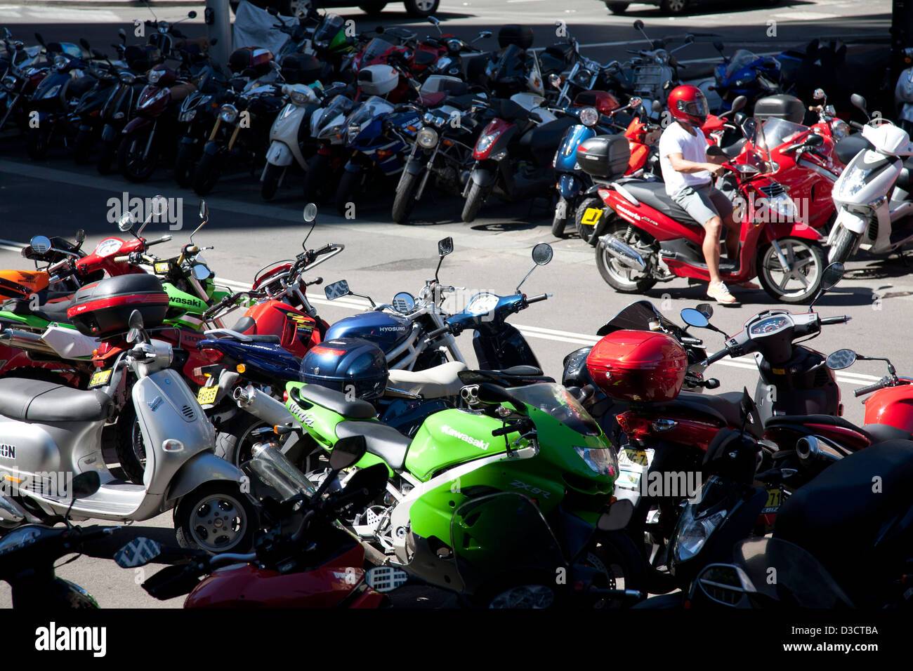 Commuter Motorcycle, mopeds, scooters Parking on King Street near Darling Park Sydney Australia Stock Photo