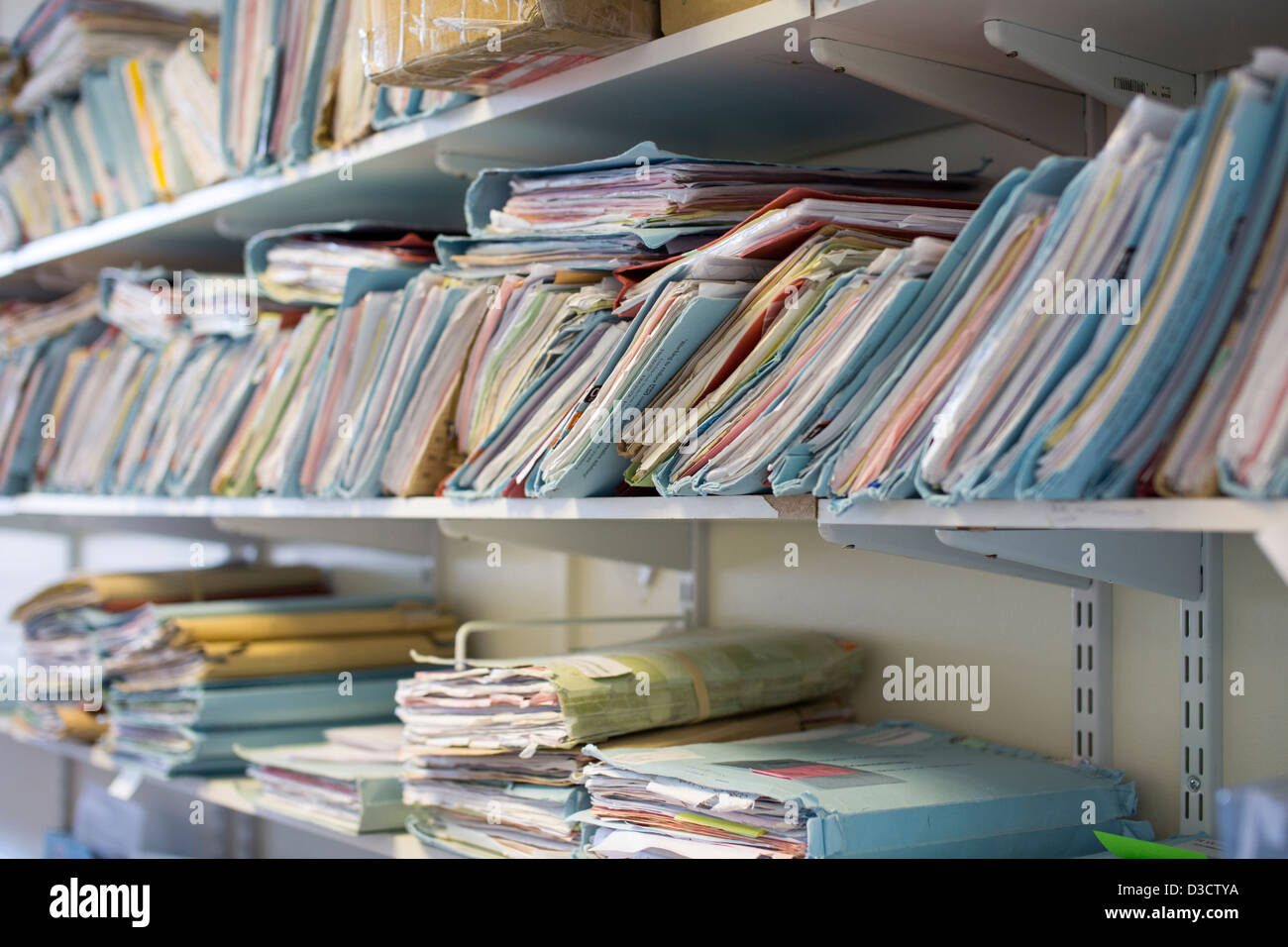 medical records on shelf in hospital outpatients department Stock