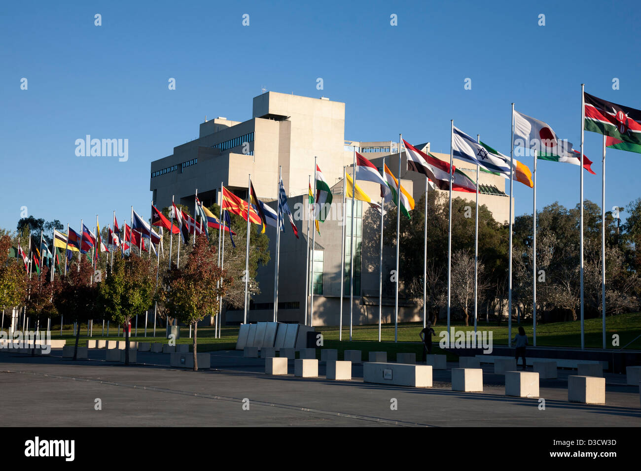 United Nations flags in front of the High Court of Australia Parkes Canberra ACT Australia. Stock Photo