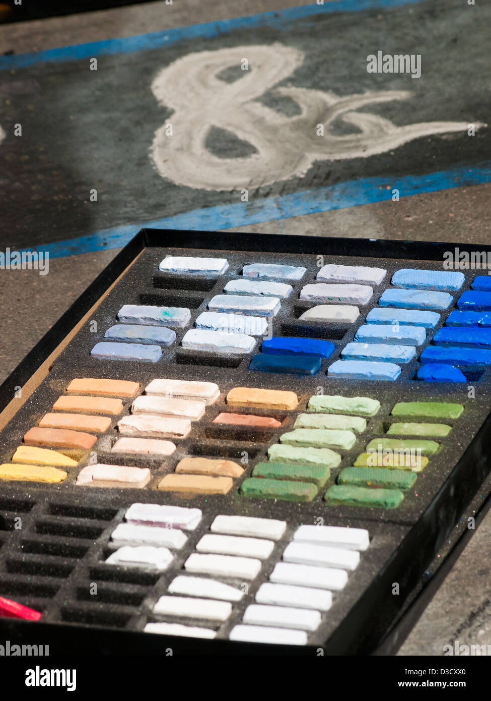 Chalks on the street during Chalk Art Festival in Denver, Colorado