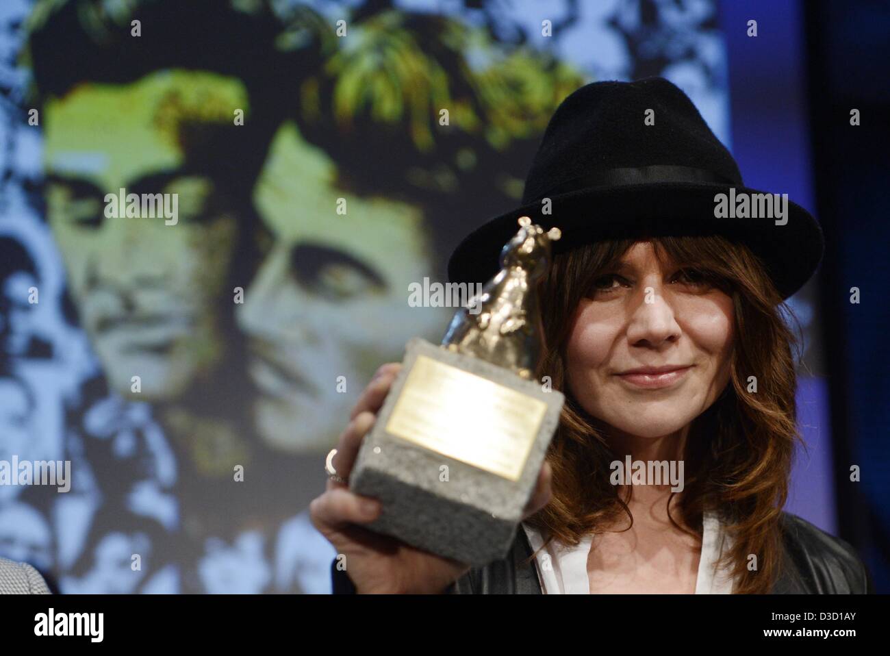 Polish director Malgoska Szumowska shows her Teddy Award for her film 'In the name of' (W imie) at Teddy ceremony as part of the 63rd annual Berlin International Film Festival aka Berlinale, in Berlin, Germany, 15 February 2013. The 27th Teddy Award is on of the most prestigious queer film prizes. As a symbol of political engagement, the award is presented in recognition of films and individuals involved in communicating queer issues to a wide audience. Photo: Jens Kalaene/dpa Stock Photo