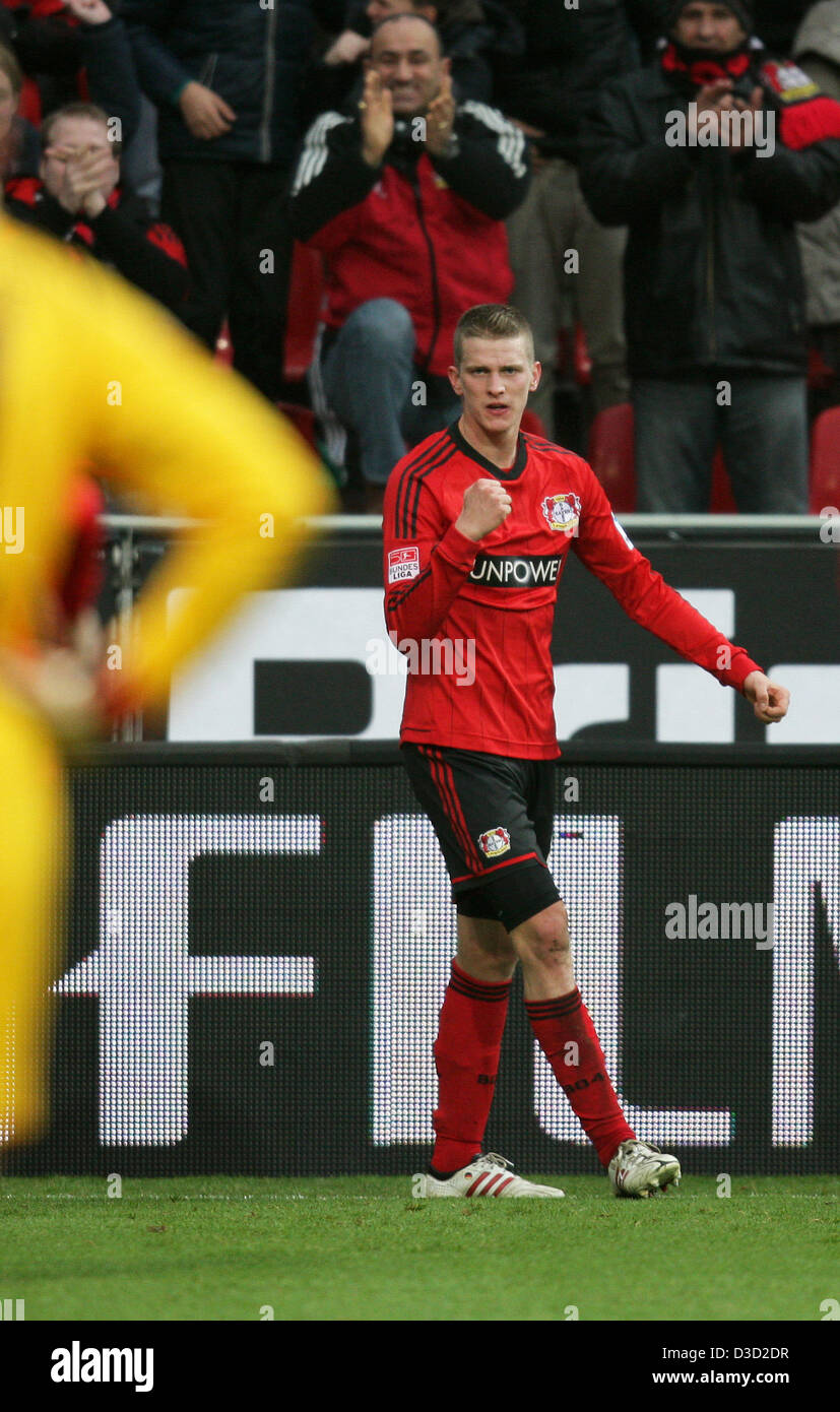 Leverkusen's Lars Bender (C) celebrates his 2-0 goal during the German ...