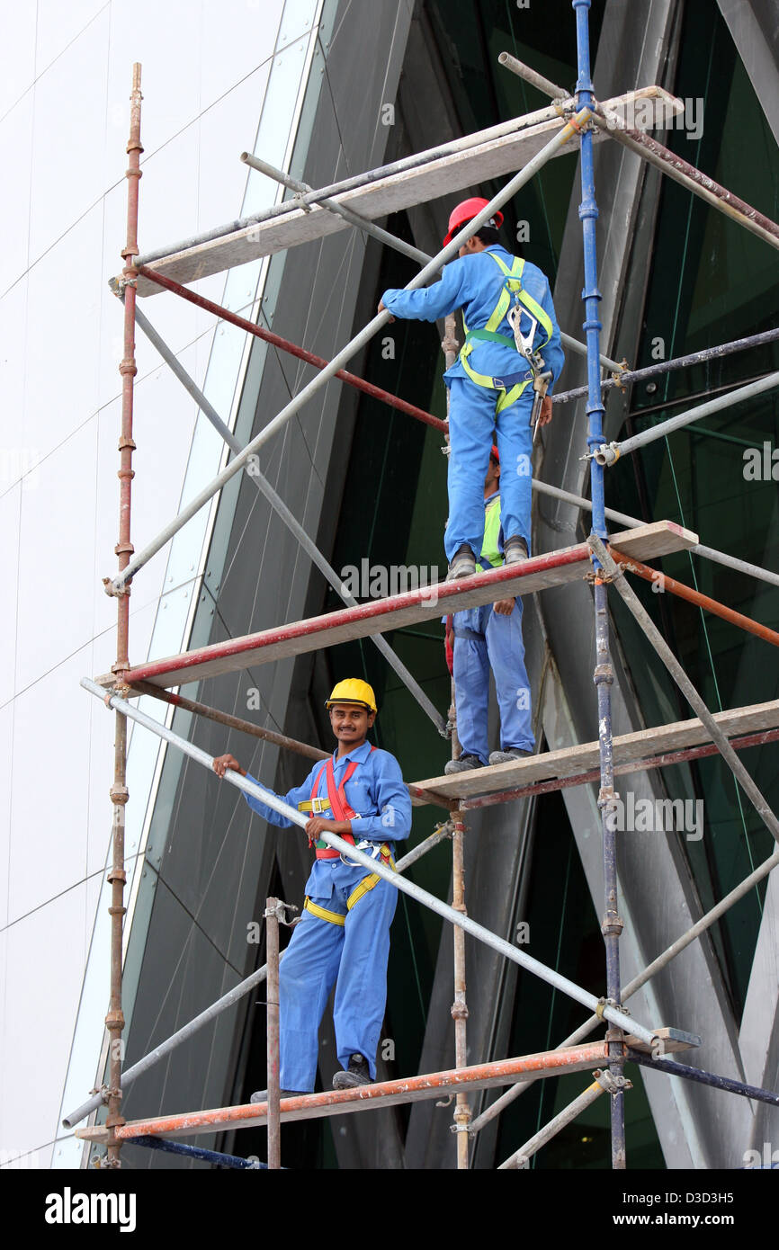 Dubai, United Arab Emirates, construction workers standing on